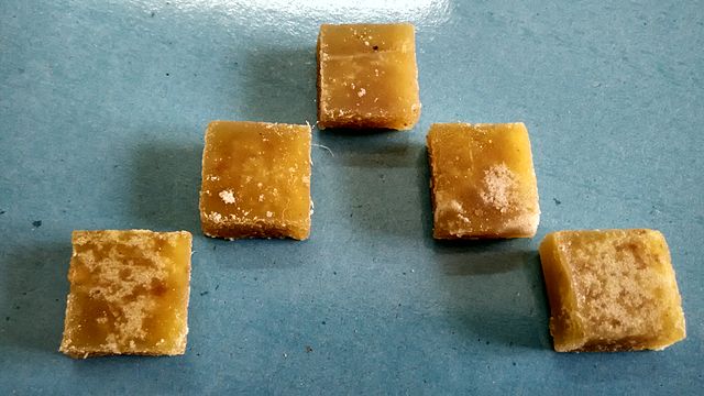 five square pieces of ginger candy