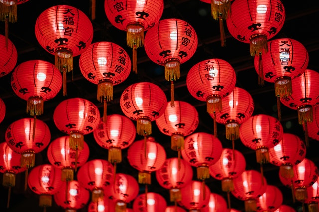 red lanterns illuminated by light bulbs used as chinese new year decoration