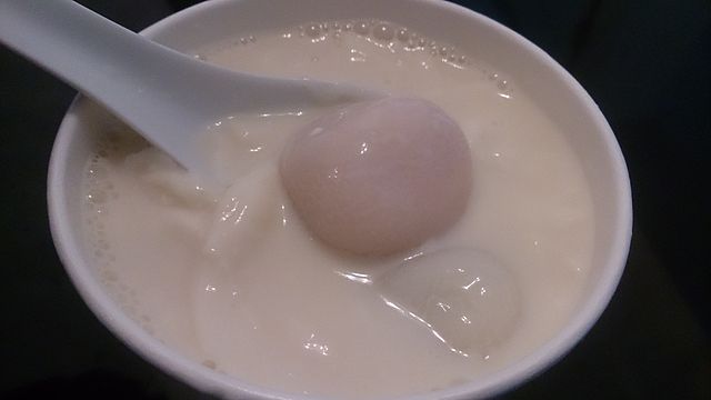 rice balls soaked in a bowl of of bean curd
