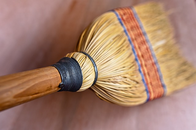 a rice straw broom used to sweep the floor